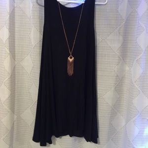 Black dress with necklace accent